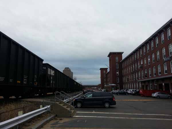 Northbound loaded coal train through Manchester