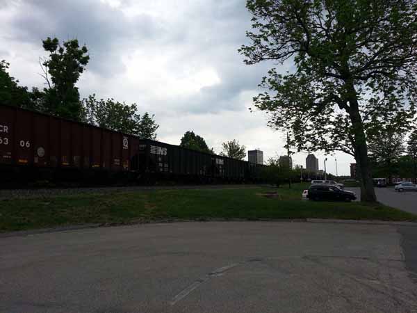 Northbound loaded coal train through Manchester
