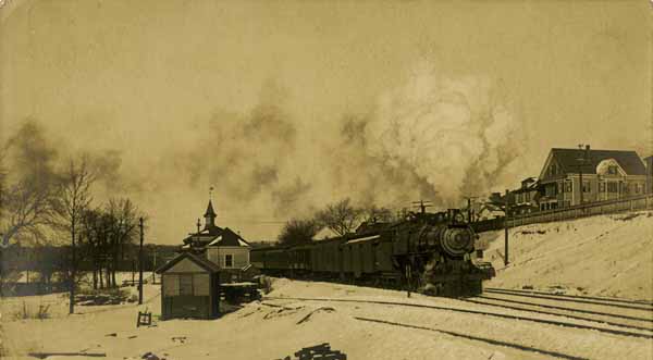 First train over new bridge leaving Bradford, Massachusetts