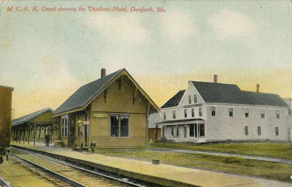 Maine Central Railroad Depot showing the Vendome Hotel, Danforth, Maine