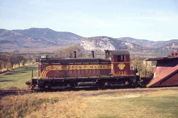 Boston & Maine #1230 pulls the last of the B&M equipment from the North Conway yard